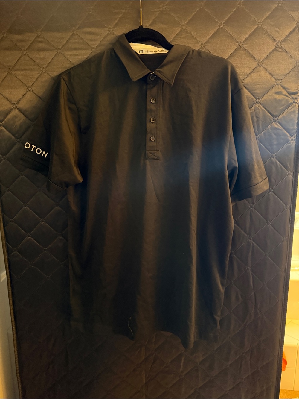 Travis Mathew peloton Minimalist Black Short-Sleeve Polo Shirt -